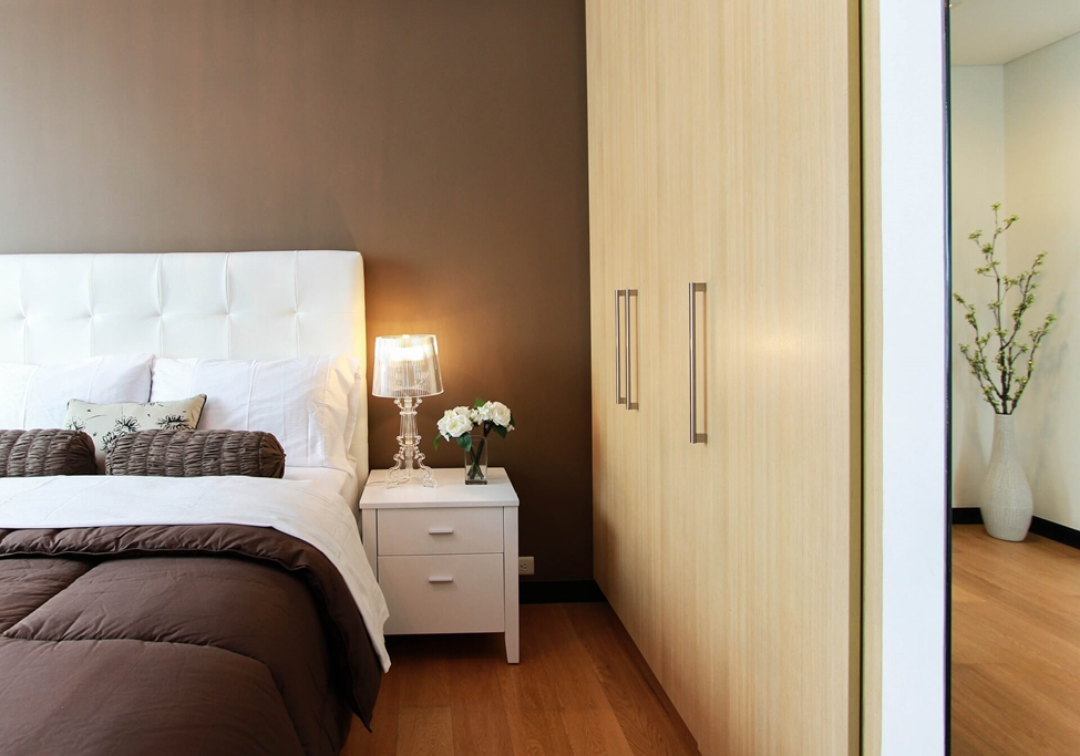 Soft ceiling lighting with an accentuated lampshade is the most popular option among bedroom lights